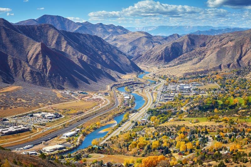 A view of the mountains and river from above.